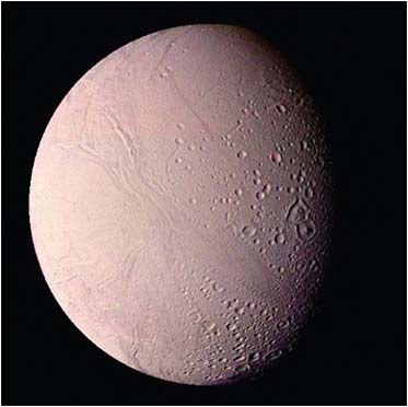 FIGURE 7.8 Saturn’s moon Enceladus. The grooves, faults, and smooth regions are the result of extensive, continuing geological activity. SOURCE: Courtesy of NASA/JPL.