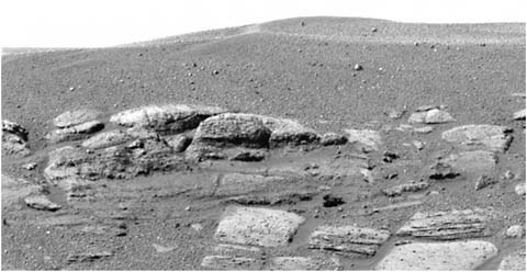 FIGURE 3.14 Mars has a history. The history of Mars can be read in sedimentary layers like these at the Opportunity rover landing site. SOURCE: Courtesy of NASA/JPL/Cornell.