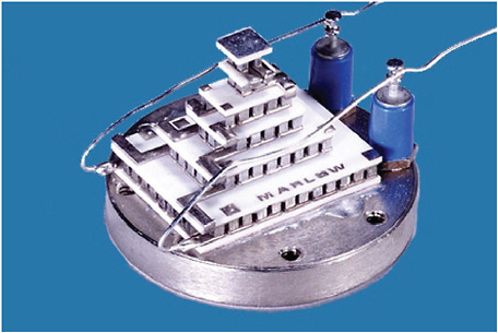 FIGURE 4-6 Marlow Industries’ MI6030-01BC. NOTE: The base dimensions are 21.84 × 28.19 mm. The module height is 20.73 mm. SOURCE: Marlow Industries, Inc., Subsidiary of II-VI Incorporated, 10451 Vista Park Rd, Dallas, TX 75238. Image available at http://www.marlow.com/thermoelectric-modules/six-stage/mi6030.html. Accessed March 25, 2010.