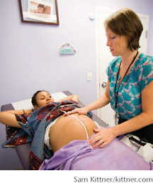 A pregnant woman receives prenatal care at the Family Health and Birth Center.