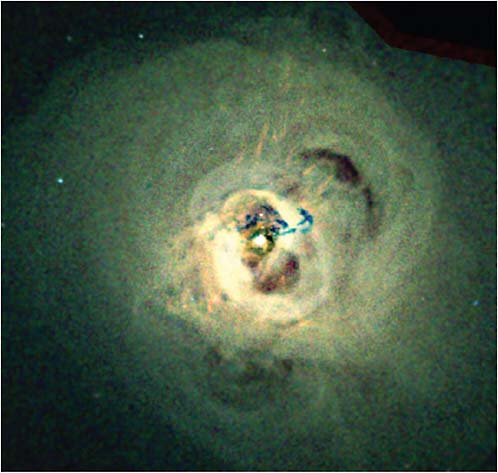 FIGURE 3.7 Chandra X-ray image of the Perseus cluster. Low-density regions are seen as dark bubbles surrounded by bright regions of hot, X-ray-emitting gas, believed to be generated by outbursts of activity from the central black hole. This may be direct evidence for feedback between black hole growth and cluster evolution. SOURCE: Courtesy of NASA/CXC/IoA/A. Fabian et al.