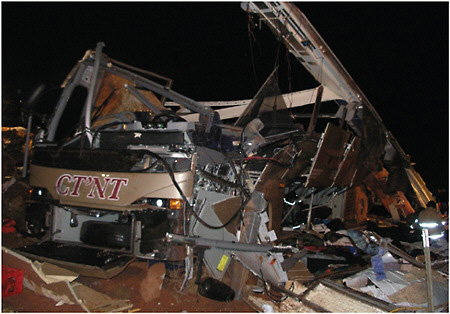 FIGURE 2-1 The fourth tour bus after a 360-degree roll 41 feet down an embankment.