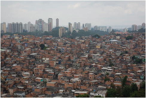 FIGURE 2-4 Juxtaposition of urban slums and modern buildings in São Paulo, Brazil.