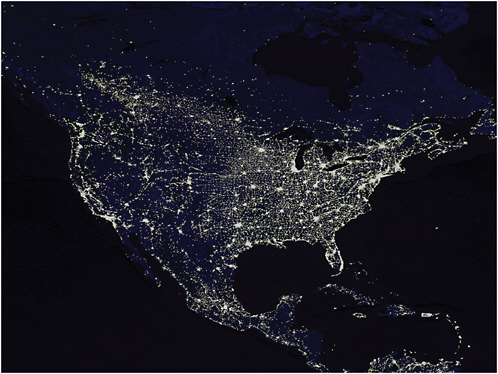 FIGURE 12.1 Lights of North America at night. Note the continuous lighting of extended concentrations of large cities (urban conglomerations), such as Washington to Boston, San Diego to Santa Barbara, and southwestern Lake Michigan. SOURCE: NASA (2001).