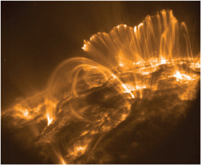 FIGURE 1.1.1 This X-ray image shows loops of magnetic fields extending high above the solar limb into the corona and indicates that energy deposition occurs on very small scales and in a complex pattern. The spectacular images from the Transition Region and Coronal Explorer mission were made possible by the optics developed from earlier rocket experiments funded through the NASA suborbital program. SOURCE: Courtesy of NASA Transition Region and Coronal Explorer (TRACE) team.